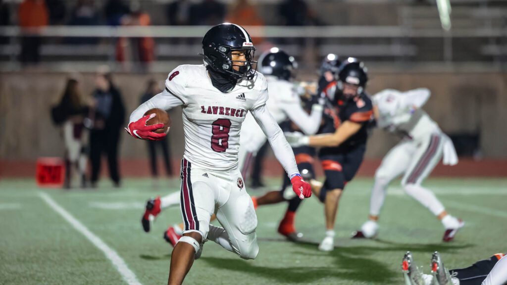 Lawrence High football vs. Shawnee Mission Northwest, playoff opener, action-21