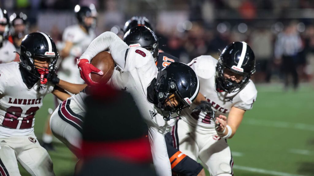 Lawrence High football vs. Shawnee Mission Northwest, playoff opener, action-22