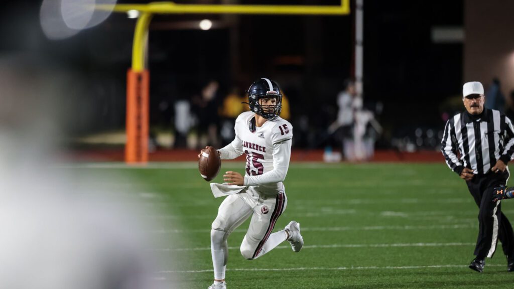 Lawrence High football vs. Shawnee Mission Northwest, playoff opener, action-27