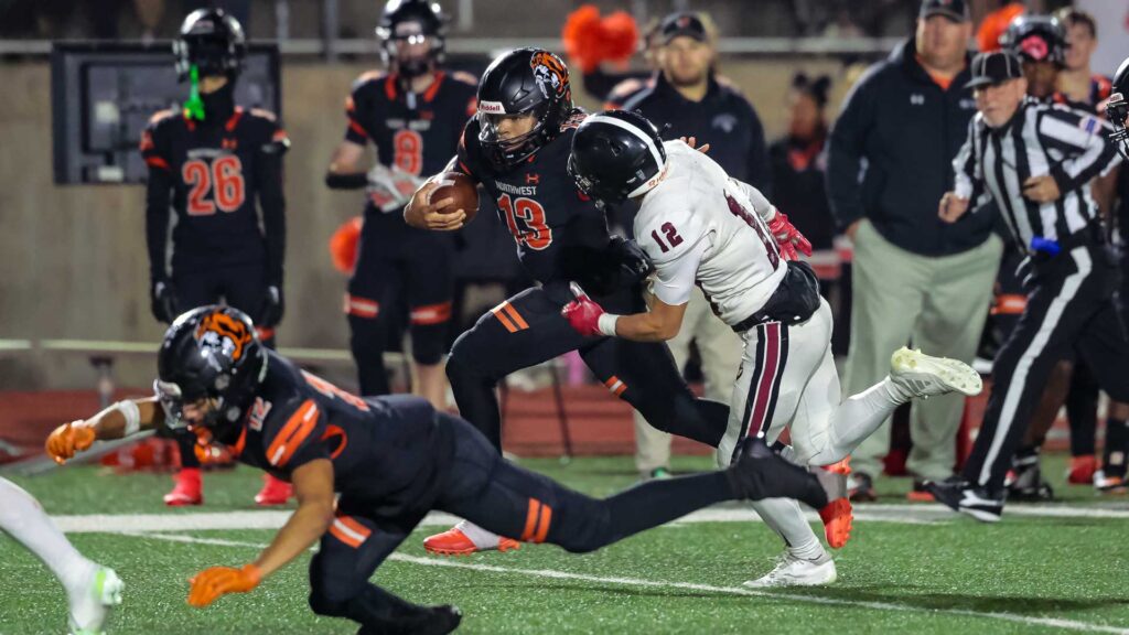 Lawrence High football vs. Shawnee Mission Northwest, playoff opener, action-3