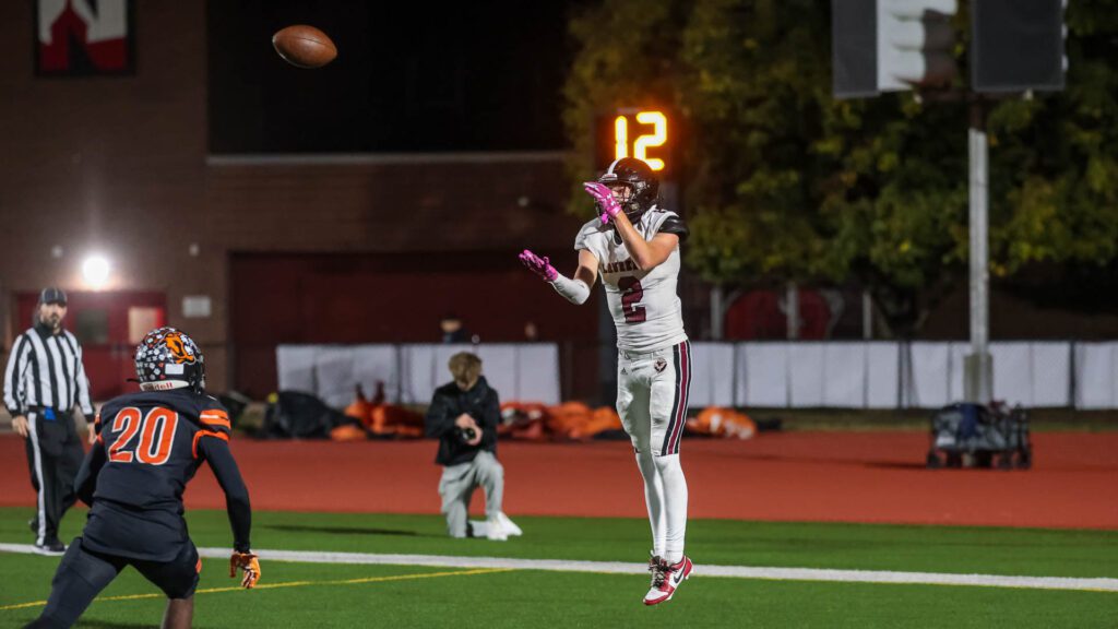 Lawrence High football vs. Shawnee Mission Northwest, playoff opener, action-32