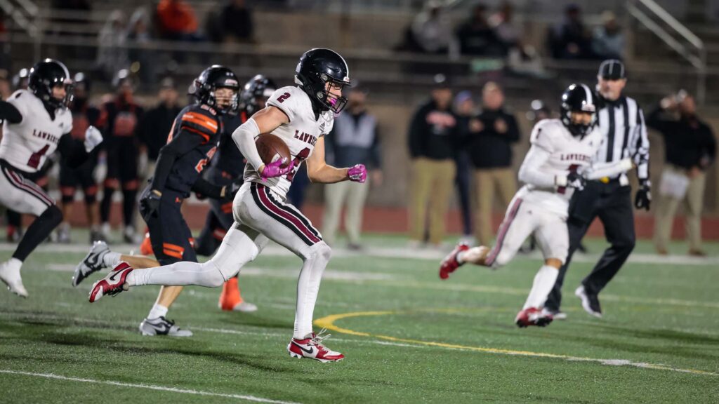 Lawrence High football vs. Shawnee Mission Northwest, playoff opener, action-64