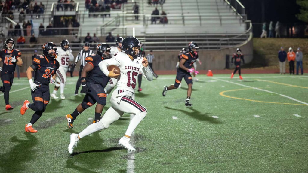 Lawrence High football vs. Shawnee Mission Northwest, playoff opener, action-65