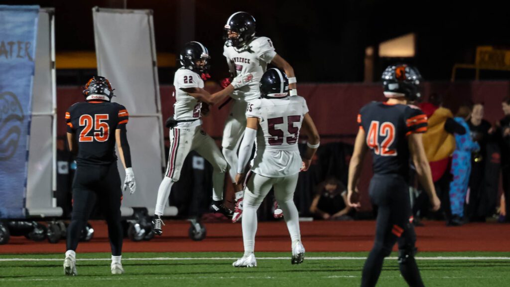 Lawrence High football vs. Shawnee Mission Northwest, playoff opener, action-7
