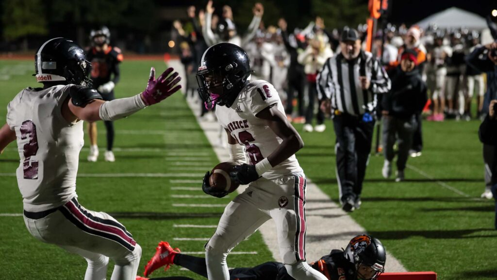 Lawrence High football vs. Shawnee Mission Northwest, playoff opener, action-76