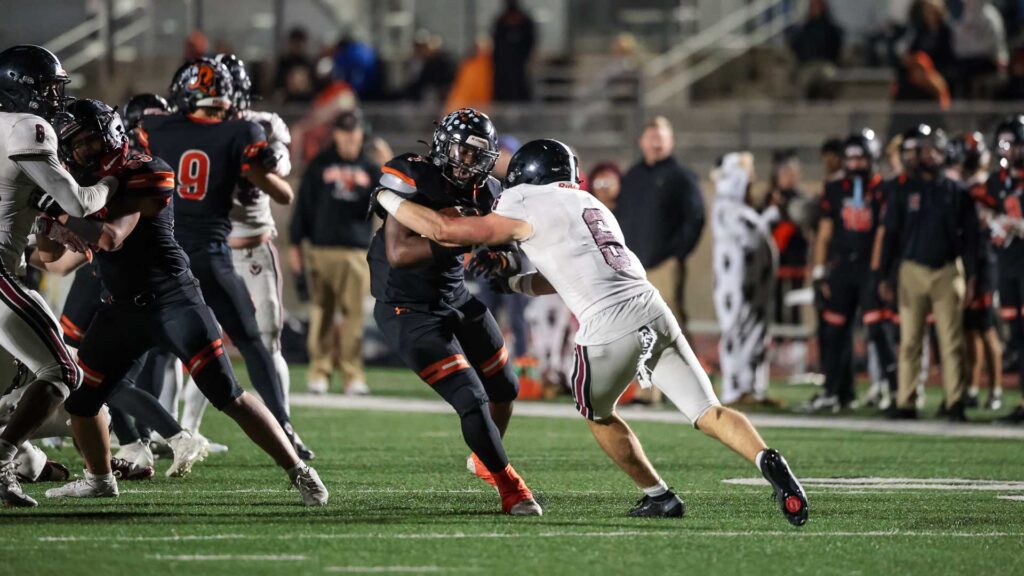 Lawrence High football vs. Shawnee Mission Northwest, playoff opener, action-78