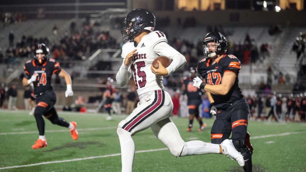 Lawrence High football vs. Shawnee Mission Northwest, playoff opener, action-80