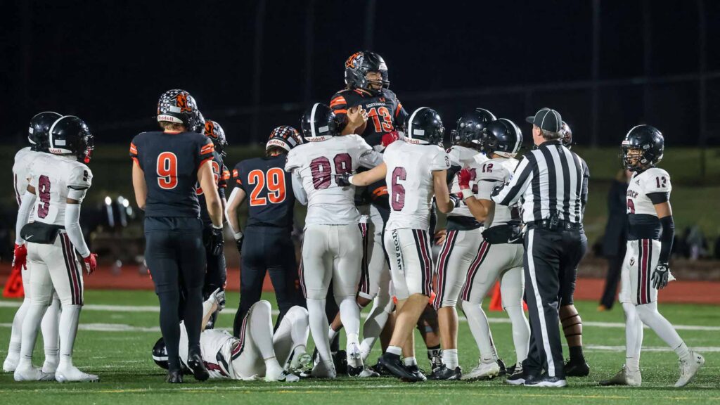 Lawrence High football vs. Shawnee Mission Northwest, playoff opener, action-9