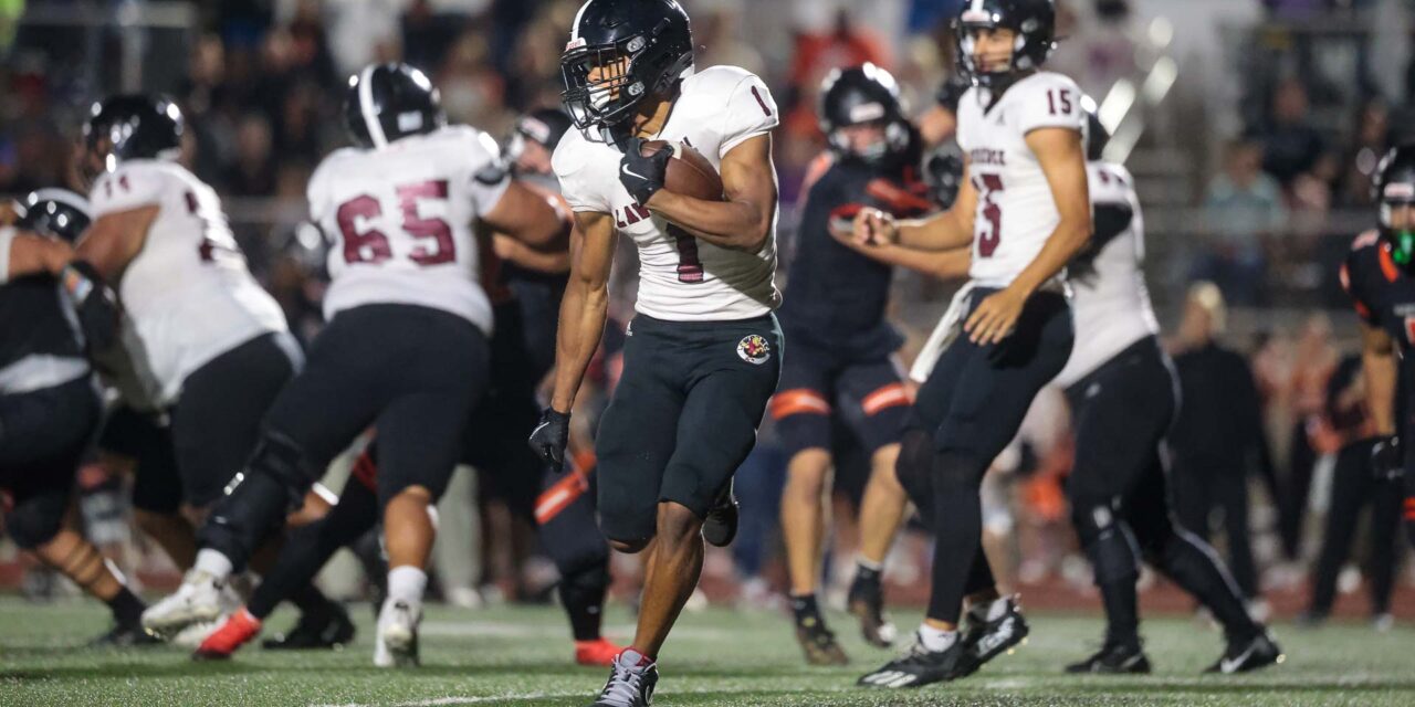 PHOTOS: Lawrence High vs. Shawnee Mission Northwest, Week 6
